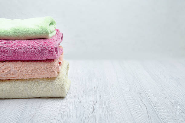 istock A stack of clean towels placed on a light background, ideal for self-care in hotel or spa settings, with copyspace available. 2209254191