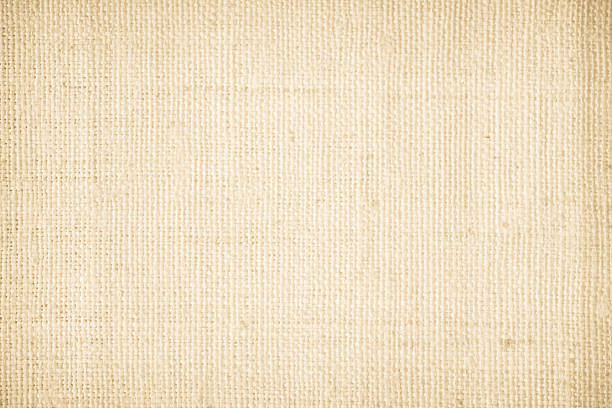 istock Brown sackcloth woven texture background in natural pattern. Jute hessian burlap, linen background in light beige cream color blank. Weaving canvas fiber line cotton cloth textured as organic. 2209259532