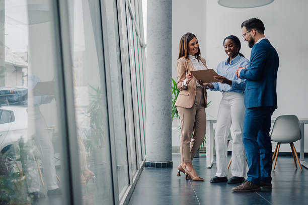 istock Business team discussing work in modern office 2209259894