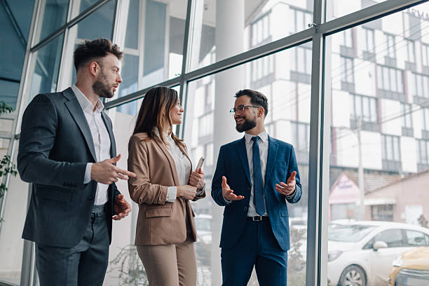 istock Business team discussing strategy in modern office building 2209259911