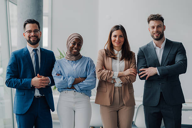 istock Smiling business team posing with confidence in office 2209259932