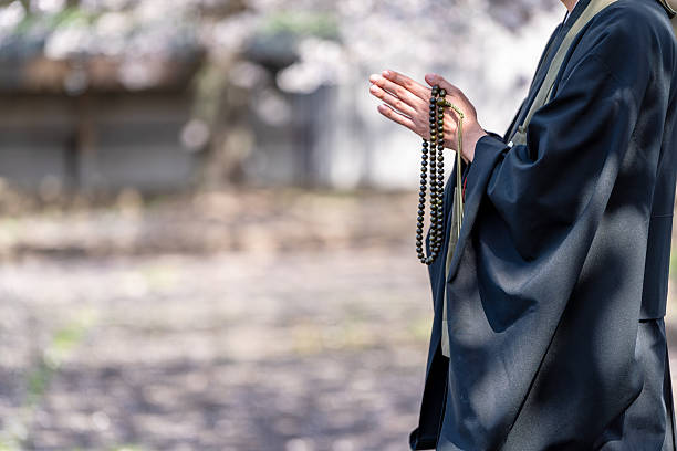 An image of a tree funeral held by a monk