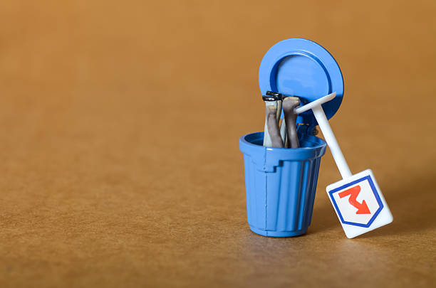istock Open Trash Can Suggesting Corporate Losses and Risk Mismanagement 2209268701