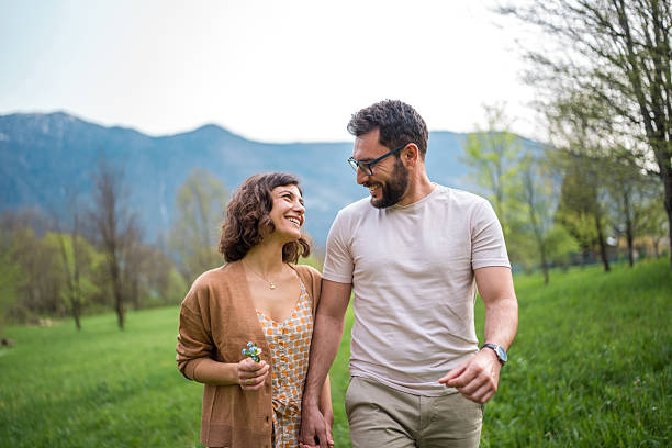 istock Romantic Stroll in Hotel Garden by Diverse Couple 2209272816