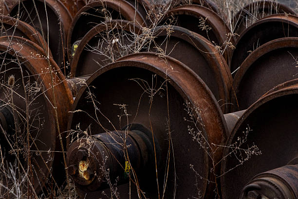 Abandoned train wheels overgrown with weeds in Cresson, Pennsylvania, United States