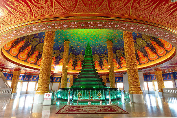 istock Green glass pagoda, Buddhist temple. Gold columns, artwork on the ceiling. 2209275438