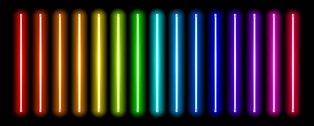 istock Fluorescent Glowing Neon LED Light Tubes Set – Realistic 3D Vertical Lamps in Red, Orange, Yellow, Green, Blue, Pink, and Purple on Black Background 2209282428