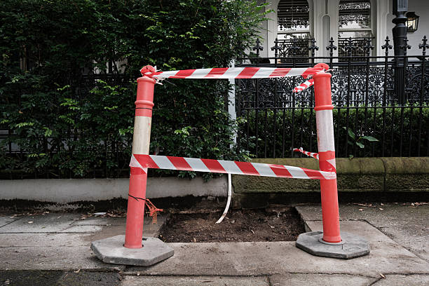istock Section of footpath under repair 2209291733