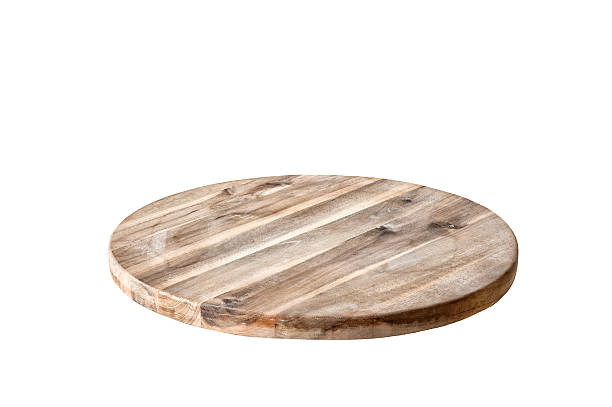 Round cutting board isolated on a white background.