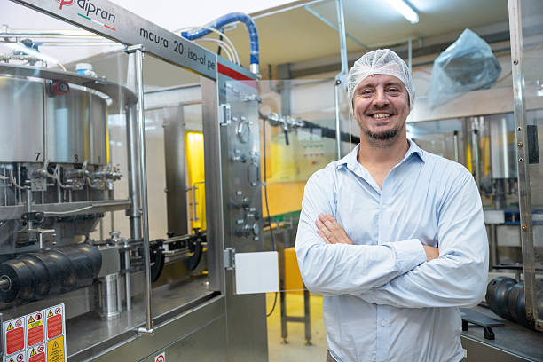 istock portrait professional engineer technician man happy smile work in drink factory, owner supervisor 2209295355