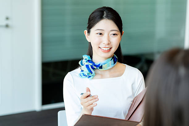 istock young woman at the reception 2209302040
