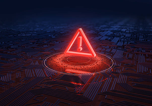 istock Warning Sign: A digitally rendered close-up of a glowing red warning sign hovering over a circuit board, depicting a cyber security threat. 2209306421