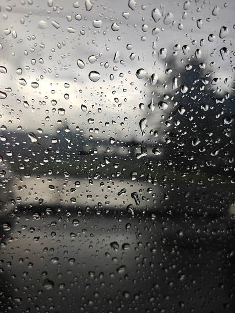 istock Raindrops on the car glass 2209320047