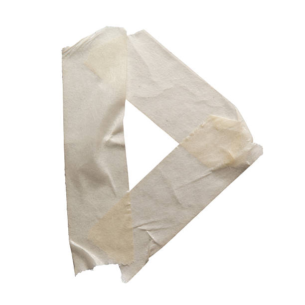 istock Letter D or triangle shape made of off-white color masking tape 2209320396