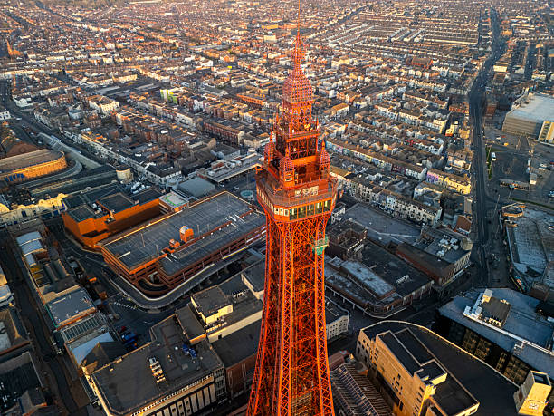 Aerial image of The Blackpool Tower at the golden hour of sunset and the townscape.