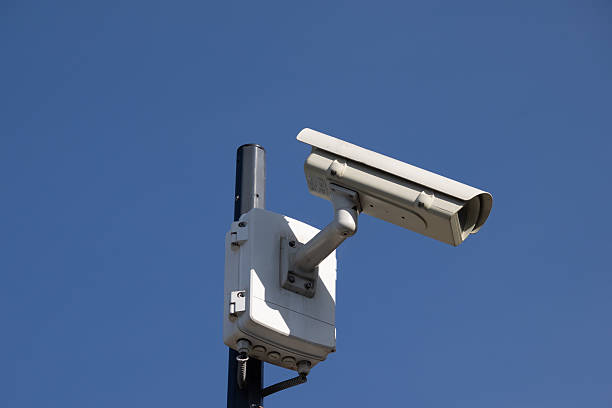 istock surveillance camera in a city 2209325217