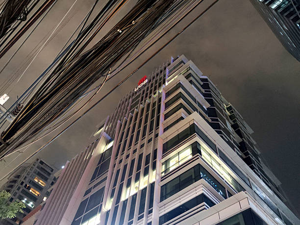 Low angle view of the renovated Robot Building, located in the Sathorn business district of Bangkok, Thailand, houses United Overseas Bank's Bangkok headquarters.