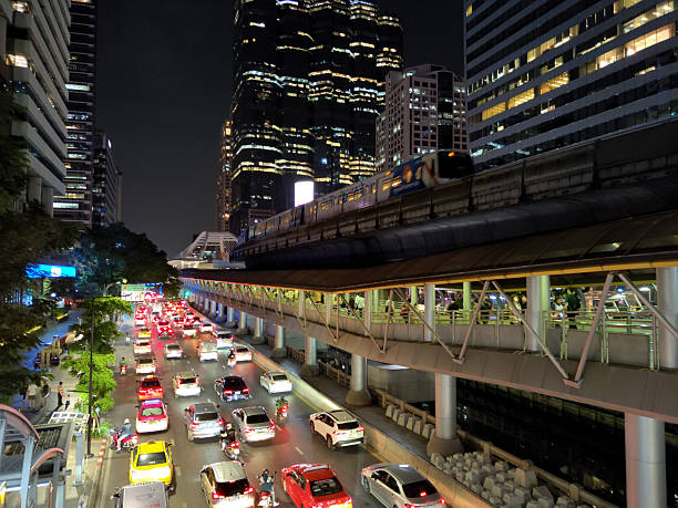 Traffic jam in Silom district at night, Bangkok downtown, Thailand.