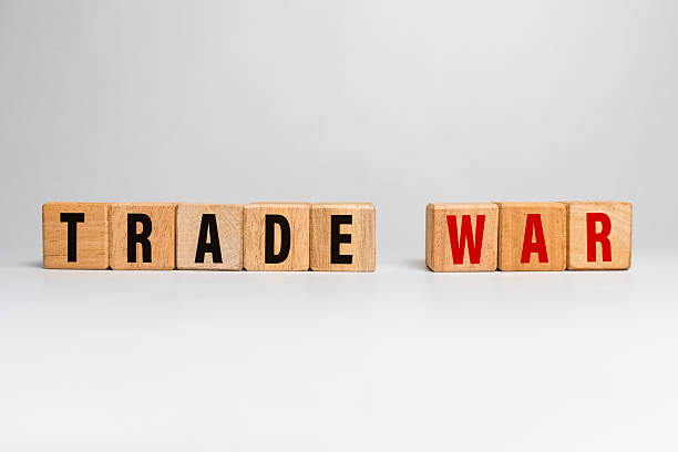 istock trade war word text on wooden blocks isolated on white background 2209334990
