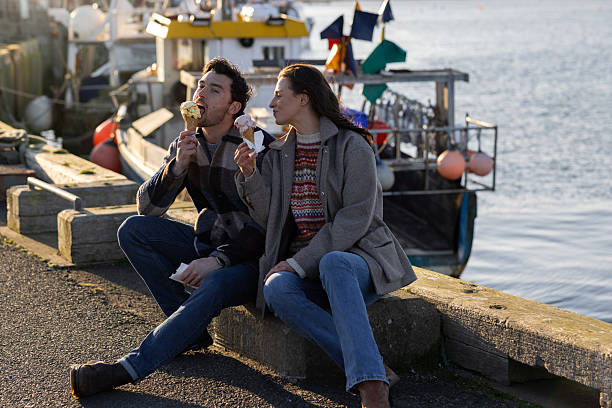 istock Couple Enjoying Delicious Ice Cream 2209335801