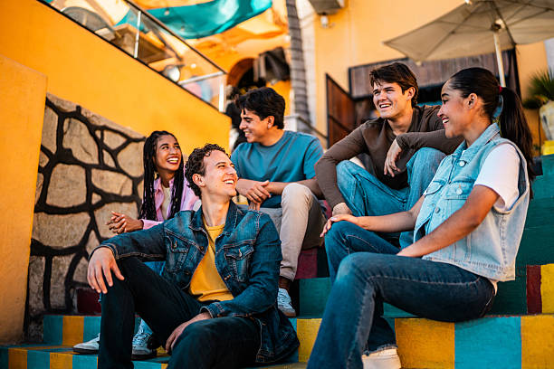 istock Young friends talking outdoors 2209345987
