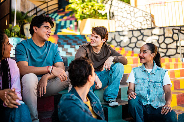 istock Young friends talking outdoors 2209346015
