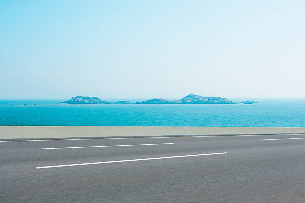 A road along the seashore. Paved road.
