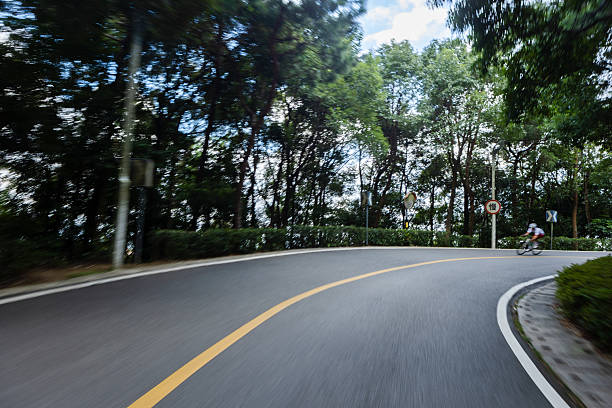 Detailed asphalt road profile: A closeup view showcasing the texture and surface intricacies of the road, inviting exploration of its unique characteristics