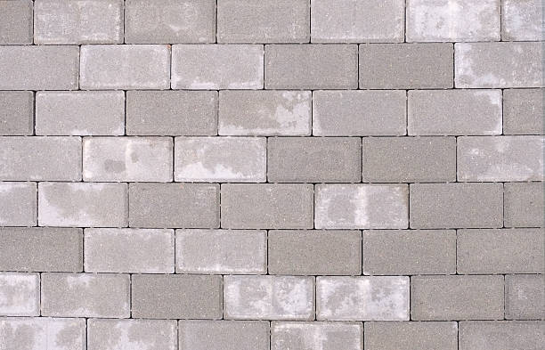 istock High-resolution texture of gray pavement tiles with a clean, uniform arrangement. Top view. 2209350177