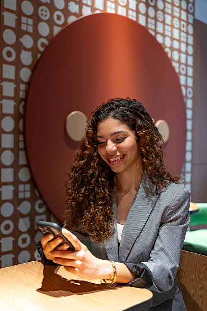istock Business teenager using smartphone at cafe table 2209350592