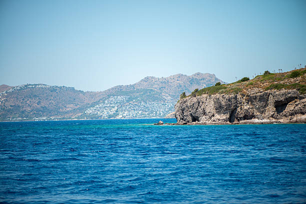 A breathtaking view of the crystal-clear blue sea and picturesque islands in Bodrum, capturing the essence of coastal beauty and serenity.