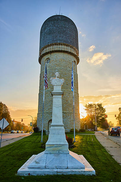 istock Golden Hour at Ypsilanti Water Tower with Marble Bust and Flags 2209366652