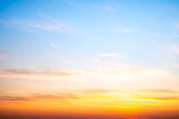 istock Beautiful , luxury soft gradient orange gold clouds and sunlight on the blue sky perfect for the background, take in evening,Twilight, Large size, high definition landscape photo 2209370910