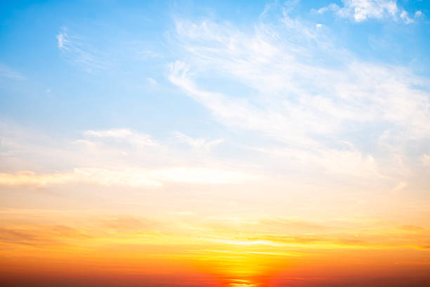 istock Beautiful , luxury soft gradient orange gold clouds and sunlight on the blue sky perfect for the background, take in evening,Twilight, Large size, high definition landscape photo 2209371155