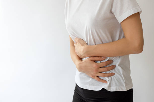 istock Unrecognizable female having stomachache 2209377416