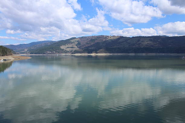 istock A body of water with mountains in the background 2209384282