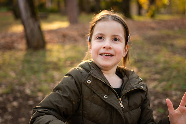 istock Happy girl playing whit bubbles 2209384984