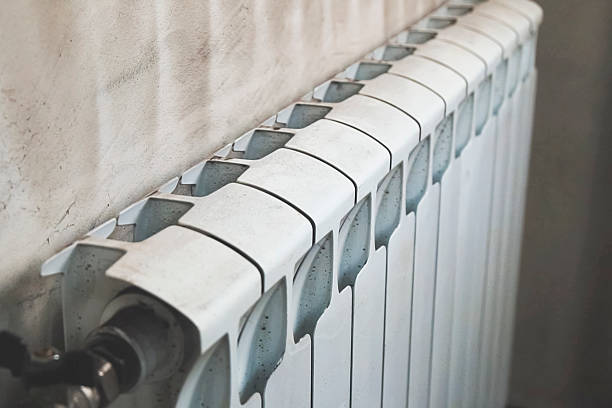 istock radiators of the heating system are white. warm radiators. 2209392645