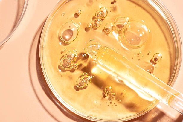 istock Retinol serum gel in petri dish 2209395753