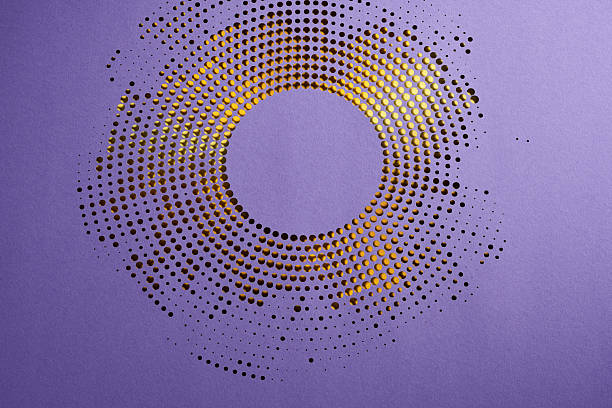 istock Circular halftone paper cut design with black dot pattern revealing golden yellow layer beneath vibrant purple surface 2209396974