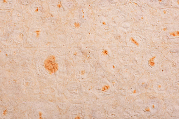 istock Thin pita bread as a background macro photo. Food background. 2209399430