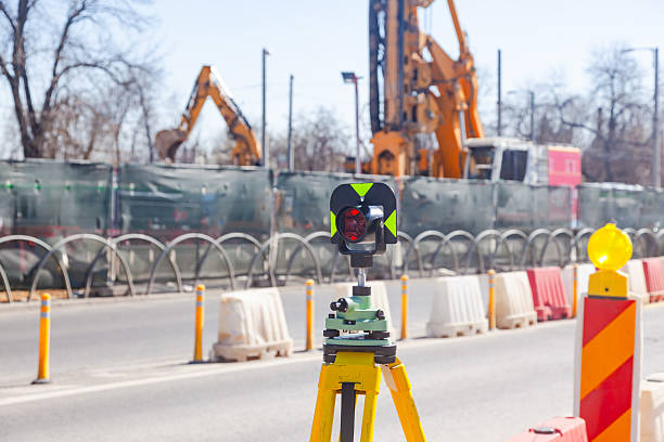 istock An optical road level stands on a road undergoing repairs. 2209401439