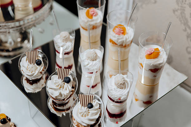 istock A table with a variety of desserts in clear plastic cups 2209402960