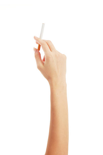 istock Woman hand holding a cigarette 2209406911