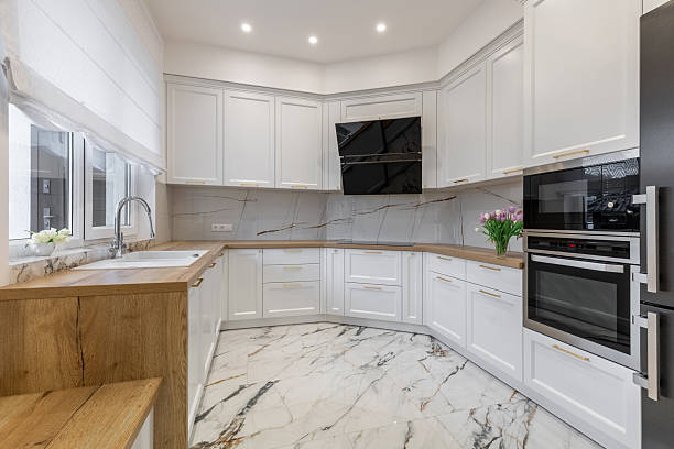 istock Modern White Kitchen with Wooden Accents 2209408841