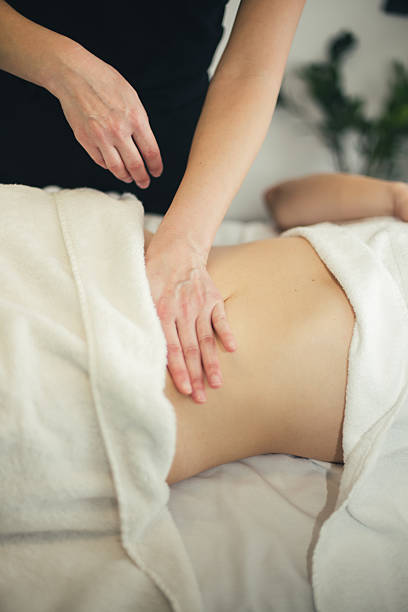 istock Belly massage stock photo 2209415427