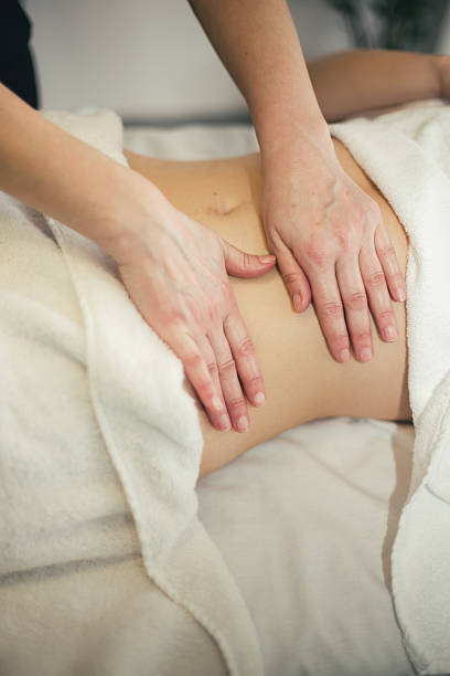 istock Belly massage stock photo 2209416019