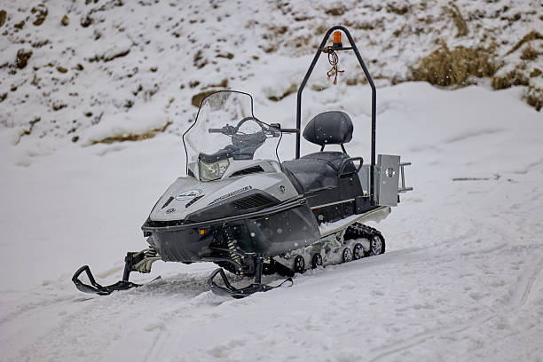 Snowmobile scooter at the ski resort. Cerler, Spain - March 07, 2024.