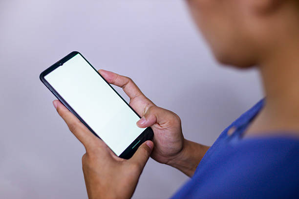 istock Portrait of woman using mobile smartphone and interacting with mobile app for design element, poster, etc 2209423538