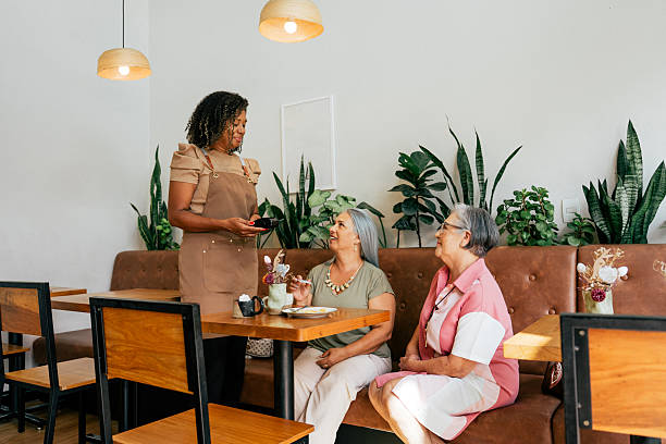 istock Women making contactless payment at coffee shop 2209425948